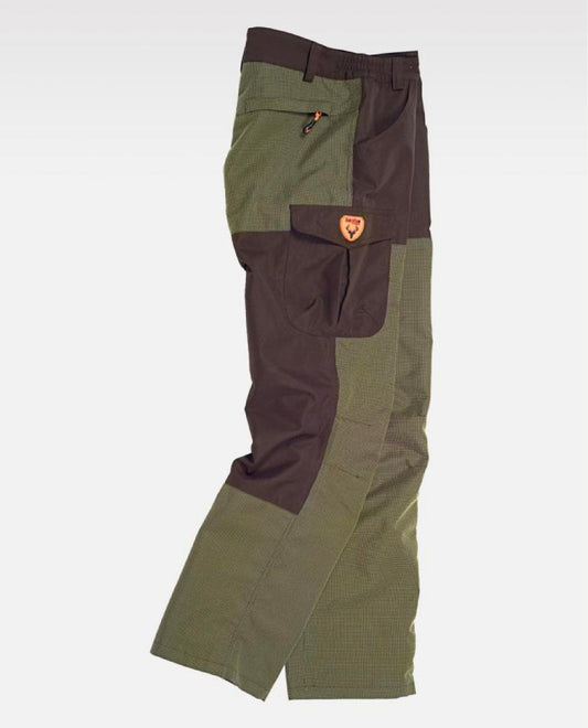Pantalon combinado, con 2 bolsos laterales, 2 traseros y 1 bolso en pernera.